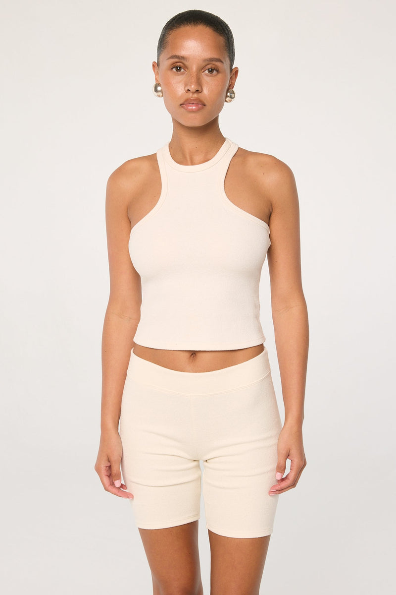 新品・未使用【OMMO】タンクトップ ASYMME TUCK KT TOP 白 Tatum - Vanilla Cropped Racerback Tank Top | The Line by K