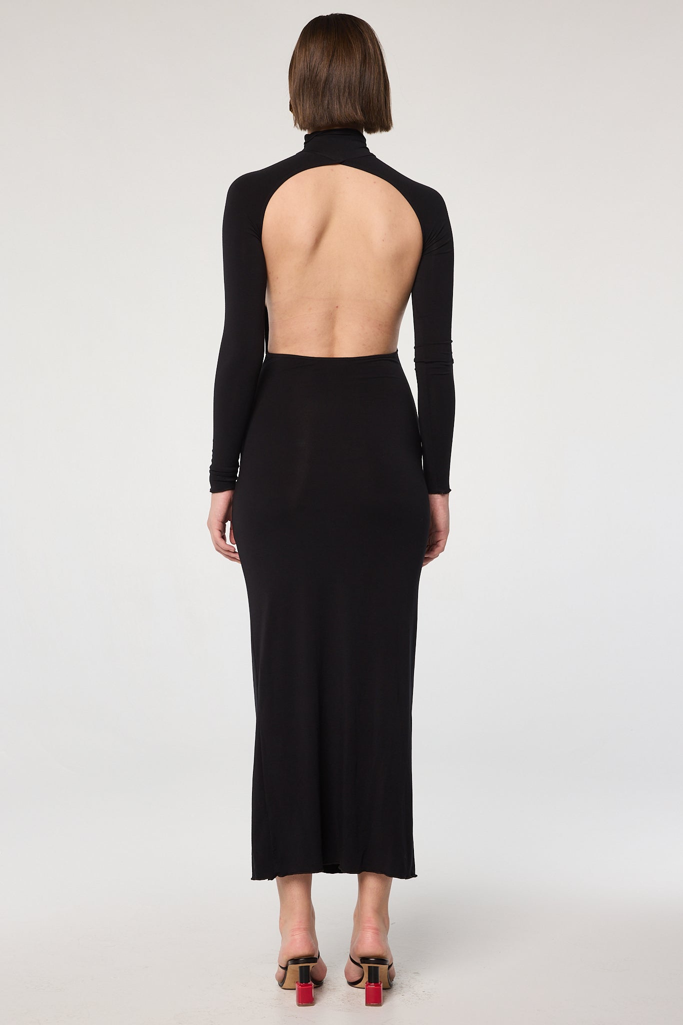turtleneck dress open back The Line by K Lenny in Black More than just aesthetics Elevate your style with Color:Dark Coffee Sapphire